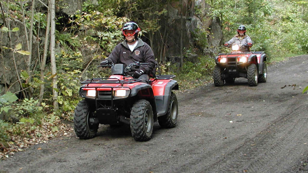 ATV riders on a local trail