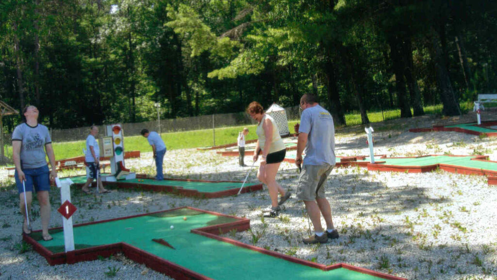People playing Mini Golf at McCaslin Mountain Campground